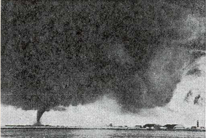 This photograph documents another natural disaster that hit Fargo, N.D. - the devastating tornado of June 20, 1957. In this picture, the tornado is headed toward Hector International Airport. Photo by Dr. T. Theodore Fujita.