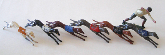 Johillco's rare and colorful 1930s racing greyhounds set with six lithe dogs and a race-starter bolted to $1,888 against a high estimate of $280.