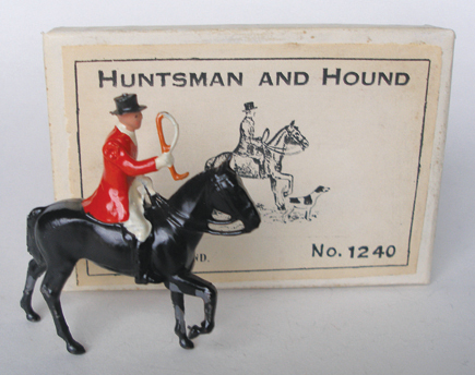 In his top hat and "pinks," but lacking a hound, Britains' 1933-1935 Huntsman with reproduction box achieved $472 - more than five times its high estimate.