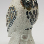 Arie Meaders, matriarch of the White County, Georgia, pottery dynasty created this 8-inch pottery owl, which sold for $16,100. Also by Arie Meaders was an 8 1/4-inch bluebird ($6,440) and a stoneware lidded canister ($3,910). Image courtesy Brunk Auctions.