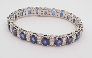 Twenty natural blue sapphires adorn this diamond bracelet to be sold at auction Saturday by Gulfcoast Coin & Jewelry. Image courtesy Gulfcoast Coin & Jewelry.