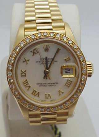 A lady's Rolex President watch has a $12,000-$13,000 estimate. Image courtesy Gulfcoast Coin & Jewelry.
