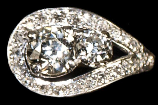 An antique platinum and diamond ring with two European round cut center stones is expected to bring $4,000-$6,000. Image courtesy Austin Auction Gallery.