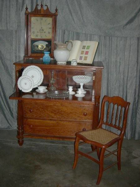 Items to be auctioned include a Seth Thomas mantle clock with painted reserve and a butler's chest with desk drawer.