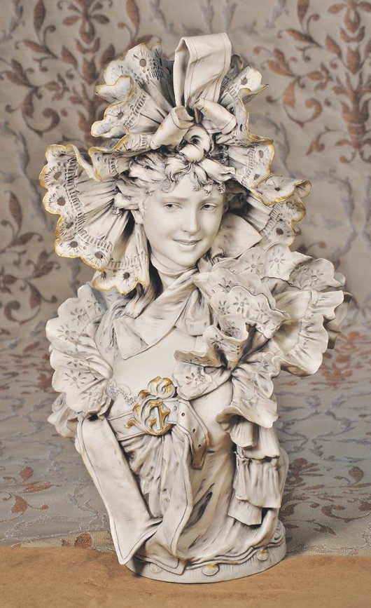 19th-century Royal Dux Bohemian bust of young lady wearing bonnet, 20 inches, estimate $2,000-$3,000. Image courtesy LiveAuctioneers.com/Frasher's Doll Auctions.
