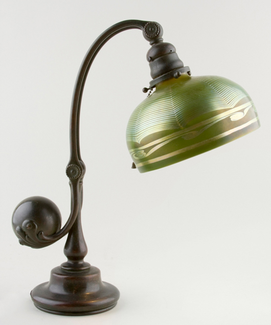 Tiffany desk lamp: Signed Tiffany Studios counterbalance desk lamp with heavy patinated bronze construction, $8,912.