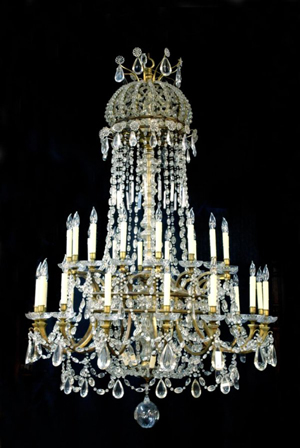 At a height of 74 inches, this antique French crystal and brass chandelier will light a ballroom. The 32-light fixture has an estimate of $20,000-$25,000. Image courtesy Lewis & Maese Auction Co.