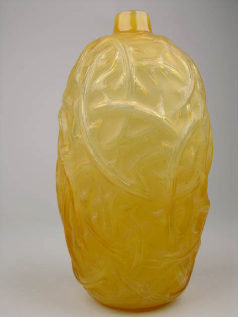 This signed Lalique Ronces vase in cased yellow glass was made circa 1920. It has a $6,000-$8,000 estimate. Image courtesy Antique Place.