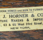 There's little doubt that this is a genuine R. J. Horner & Co. label. The question is who put it on the back of the china cabinet.