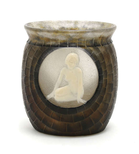 Argy-Rousseau pate-de-verre vase, Jeunesse, circa 1932, of flattened form, each side decorated with a medallion centered with a female nude, signed G. Argy-Rousseau, impressed France to base. Height 5 3/4 inches. Estimate $15,000 to $25,000. Image courtesy Leslie Hindman Auctioneers.