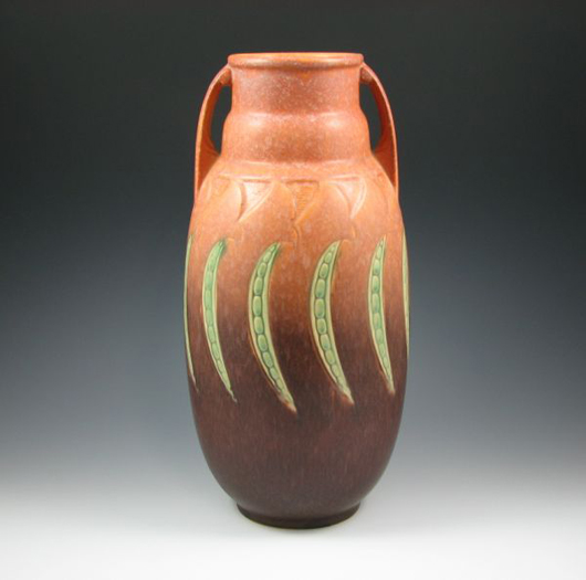 Peapod-like decorations identify Roseville's Falline line. This vase in the 655-15 inch form is estimated at $700-$900. Image courtesy Belhorn Auction Services.