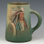 Weller's Dickens Ware Second Line, 1897-circa 1905, is marked by graffito decoration. The Indian chief mug is estimated at $500-$700. Image courtesy Belhorn Auction Services.