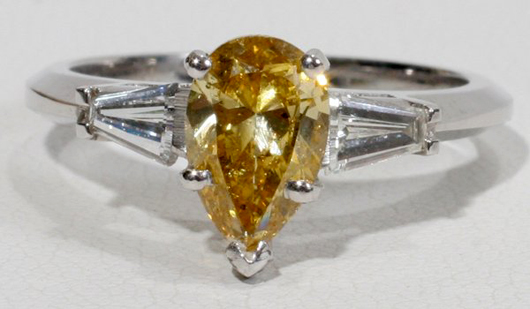 1.12 carat fancy yellow pear-shape diamond ring, .50 carats of side diamonds,14K white gold. Estimate $7,000-$10,000. Image courtesy LiveAuctioneers.com and DuMouchelles.