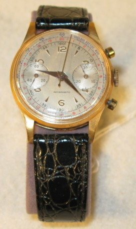 The watches in Friday's auction came from a clock collector who had stored them for up to 30 years. This 1940s Breitling two-dial chronograph is in 18K gold. Image courtesy Tom Harris Auctions.