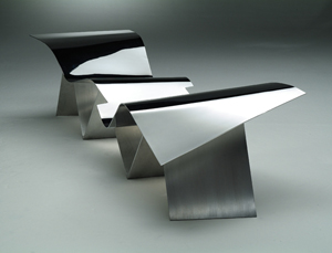 Executed in tempered aluminum by Emeco, Gehry's Tuyomyo bench for two (2009) resembles his metal-sheathed architectural works. Image courtesy Sotheby's New York.