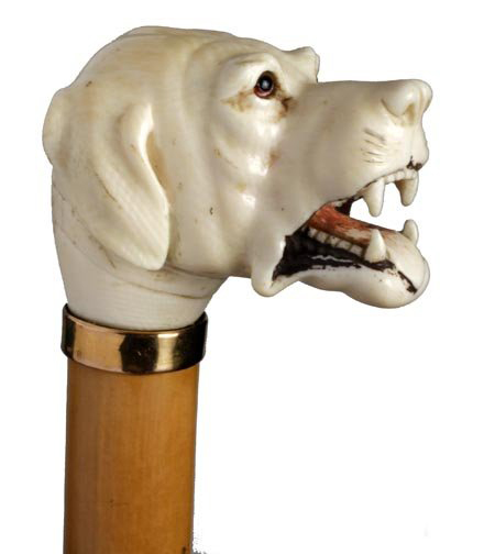 The owner of this cane always went walking with his dog. The late Victorian cane features a carved ivory handle with glass eyes. Image courtesy Kimball M. Sterling Inc.