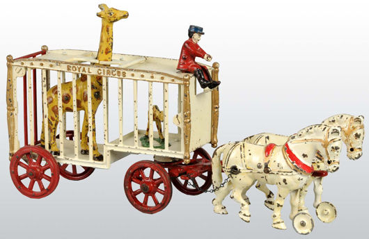 Two-horse cast-iron Hubley Royal Circus Giraffe Cage toy, 16 inches long, includes two giraffe figures. Estimate $3,000-$4,000.