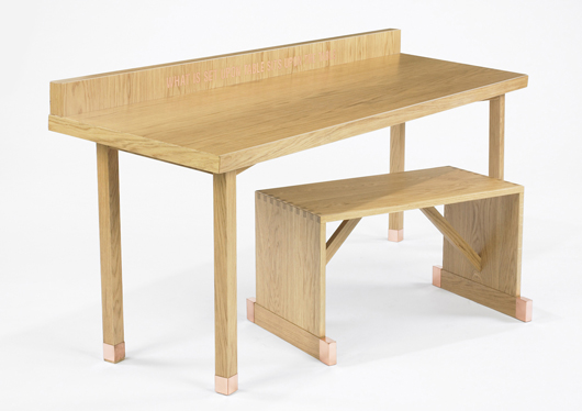 This Lawrence Weiner for MetaMemphis tiger oak and copper table and bench, 1989, titled What is set upon the table... was estimated at $5,000-7,000. It sold for $4,063. Image courtesy Wright.