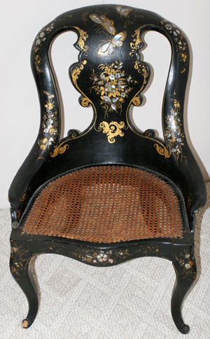Circa-1870 Victorian lacquer and mother-of-pearl chair with cane seat. From the Estate of Walter and Bluma Muller of Birmingham, Michigan. To be offered with a $300-$500 estimate in DuMouchelles' Aug. 15 auction, with Internet live bidding through LiveAuctioneers.com. Image courtesy DuMouchelles and LiveAuctioneers.com.