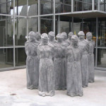 Statues collectively known as The Petrified, at entrance to The International Red Cross Museum in Geneva. Photo by Julia Lukmanova. Courtesy Wikimedia Commons.