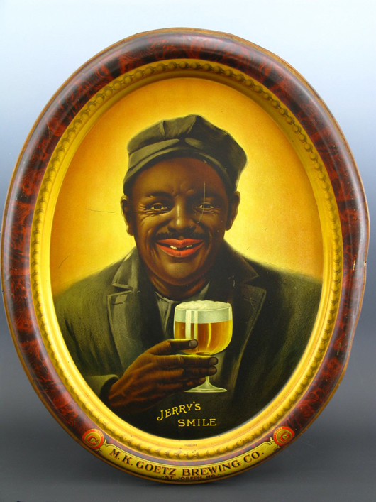 One of two Jerry Smiles framed antique tin signs from the Goetz Brewing Company of St. Joseph, Missouri. Image courtesy Dirk Soulis Auctions.
