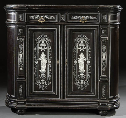 Classical scenic door panels of intricately inlaid ivory adorn this Austrian side cabinet of ebonized wood. Standing 50 inches high and 56 inches wide, the marble-top cabinet has a $1,000-$1,500 estimate. Image courtesy Jackson's.