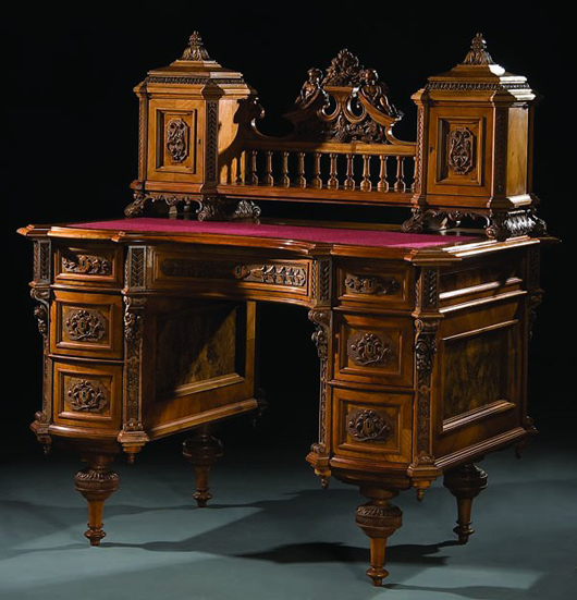 This 19th-century Austrian carved walnut and burl desk is among the most unusual desks to be sold at the liquidation of Katelman Antiques in Omaha on Aug. 15. Image courtesy Jackson's.