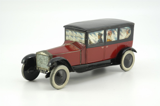 William Crawford & Sons circa-1925 Rolls-Royce biscuit tin with hinged roof that lifts open, 11¼ inches long, comes with original box. Estimate $4,000-$5,000.