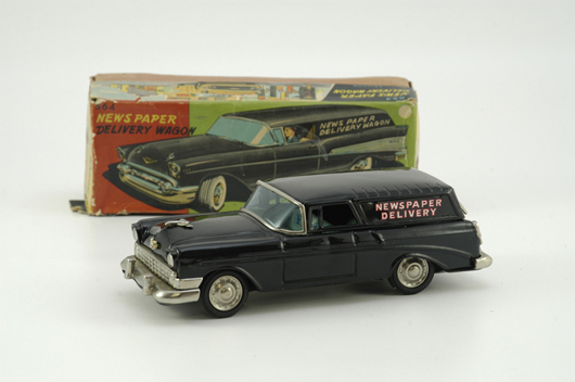 Newspaper delivery station wagon, Bandai Japan, friction, 9½ inches long with opening doors, original box. Estimate $250-$350.