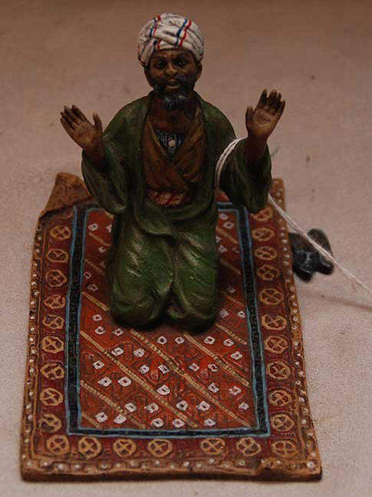 HoodBronze.jpg<br />The Bergman seal is impressed on the bottom of this Vienna bronze polychromed figure of an Arab on Oriental rug. It has a $700-$1,000 estimate. Image courtesy Bill Hood & Sons Art & Antique Auctions.