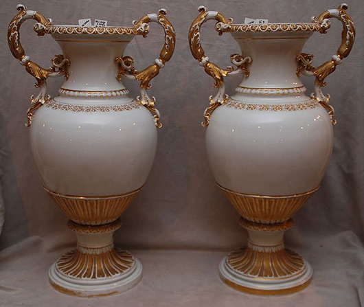 The pair of Meissen vases has old repairs around the bases and crossed swords marks. They are 22 inches high and estimated at $2,000-$2,500.