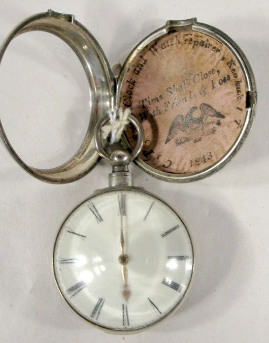 The Stevens Liverpool pocket watch is pictured outside its pair case. The paper insert in the case is dated 1843. Image courtesy Tom Harris Auctions.