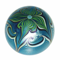 Orient & Flume started making paperweights in 1972 in Chico, Calif. This iridescent weight, made in 1978, sold at a Brunk auction in Asheville, N.C., for $208. It is 2 inches high.