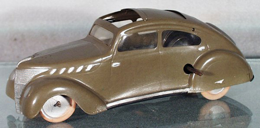 Considered a rarity, this celluloid windup car from prewar Japan has an estimate of $500-$1,000. The car has a sliding sun roof. Image courtesy Lloyd Ralston Gallery.