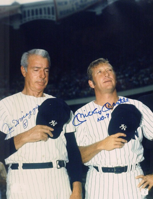 Dressed in Yankees pinstripes, possibly for an old-timers game, are Joe DiMaggio and Mickey Mantle. The 11- by 14-inch autographed photo is estimated at $400-$900. Image courtesy Written Word Autographs.