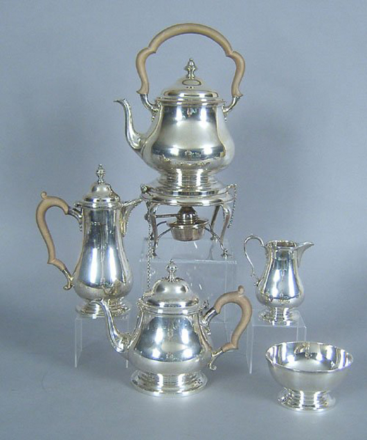 Made in England by Asprey, this five-piece sterling silver tea service dates to the 1920s or 1930s. It has an $800-$1,200 estimate.