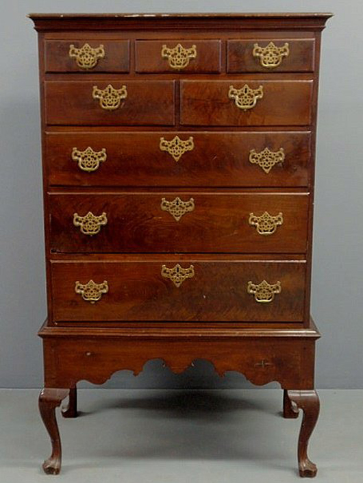 Standing 65 inches high is a Delaware Valley walnut chest-on-frame dating circa 1770. It carries a $7,000-$9,000 estimate. Image courtesy Wiederseim Associates Inc.