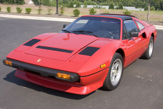 Red 1985 Ferrari 308 GTS Quattrovalvole sports car, 4-speed, with 49,013 miles (est. $15,000-$20,000). Image courtesy Leland Little Auctions & Estate Sales.