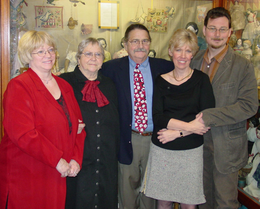 The key individuals involved in the series of auctions dispersing the contents of the Mary Merritt Doll & Toy Museum were (left to right): Marjorie Darrah's daughter, Marjorie Darrah Yocom; Marjorie Darrah, auction company owner Noel Barrett, and the specialists who cataloged the series of auctions, Becky Ourant and Andy Ourant. Andy also served as auctioneer for the Merritt sales. Photo copyright Catherine Saunders-Watson.