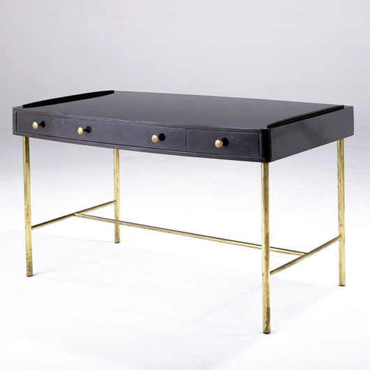 A brass frame and pulls brighten this Edward Wormley desk for Dunbar. Estimated at $1,200-1,800, the desk sold for $3,050. Image courtesy Sollo Rago.