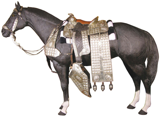 Embellished with German silver, this Impressive Ted Flowers parade saddle cost $3,000 in 1956. Image courtesy Showtime Auction Service.