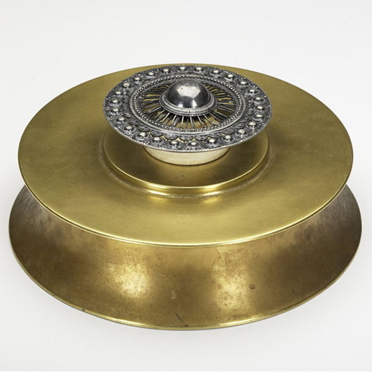 Marie Zimmermann rare brass-plated copper covered box, its lid with a dainty silver filligree medallion over an ivory finial, 3¾ inches by 8 inches, stamped M. Zimmermann Maker, estimate $800-$1,200. Image courtesy Rago’s.