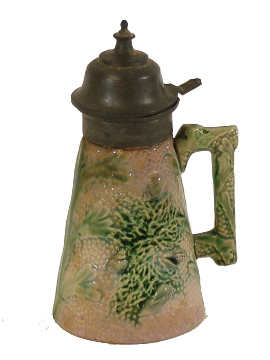 Majolica Etruscan syrup with pewter lid, circa 1880, 5½ inches tall, by Griffen, Smith & Hill of Phoenixville, Pa. Estimate $300-$400. Image courtesy The Antiques Auction Gallery.