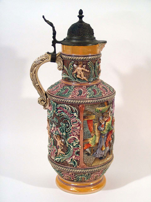 Diesenger stein, late 19th century, 21 inches tall, good example of “measle” effect unique to certain Diesinger steins. Estimate $300-$400. Image courtesy The Antiques Auction Gallery.