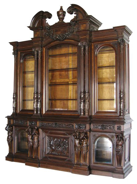 >A massive scrolling arch pediment tops this French Renaissance Revival bookcase, which has a bird’s-eye maple interior. Image courtesy Great Gatsby’s Antiques & Auctions.” title=”>A massive scrolling arch pediment tops this French Renaissance Revival bookcase, which has a bird’s-eye maple interior. Image courtesy Great Gatsby’s Antiques & Auctions.” class=”caption” /> <br /> <div id=