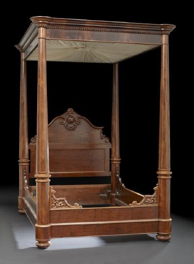 Attributed to the New Orleans warerooms of Prudent Mallard, this American Rococo Revival tester bed has a $10,000-$15,000. Image courtesy of New Orleans Auction Galleries Inc.