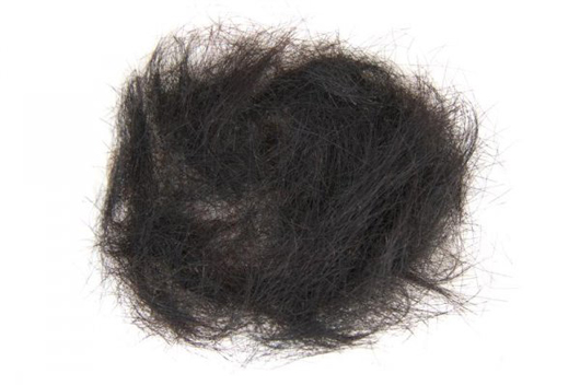Bidding might reach $100,000 for this large clump of hair, believed to be from the head of Elvis Presley. The hair represents the crowning piece of Gary Pepper's Elvis collection. Image courtesy of Leslie Hindman Auctioneers.