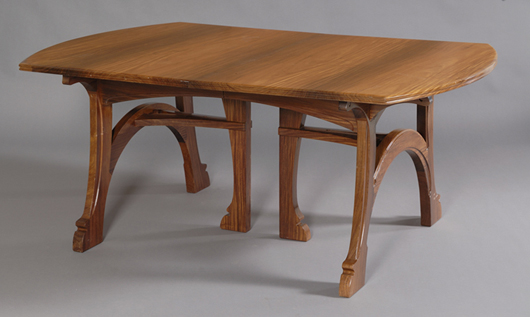 Gustave Serrurier-Bovy Art Nouveau padouk wood dining table with seven dining chairs (not shown), est. $14/18,000. Image courtesy Skinner Inc.