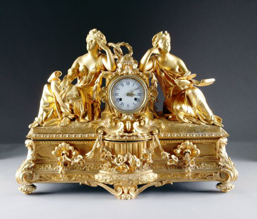 The movement on this Napoleon III figural mantel clock is stamped 'Popon à Paris.' It measures 23 inches high, 31 1/2 inches, wide and 10 1/2 inches deep. It has a $4,000-$6,000 estimate. Image courtesy of Simpson Galleries.
