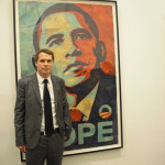Shepard Fairey posed with the 'HOPE' poster at the Institute of Contemporary Art in Boston last February. Image courtesy Wikimedia Commons.